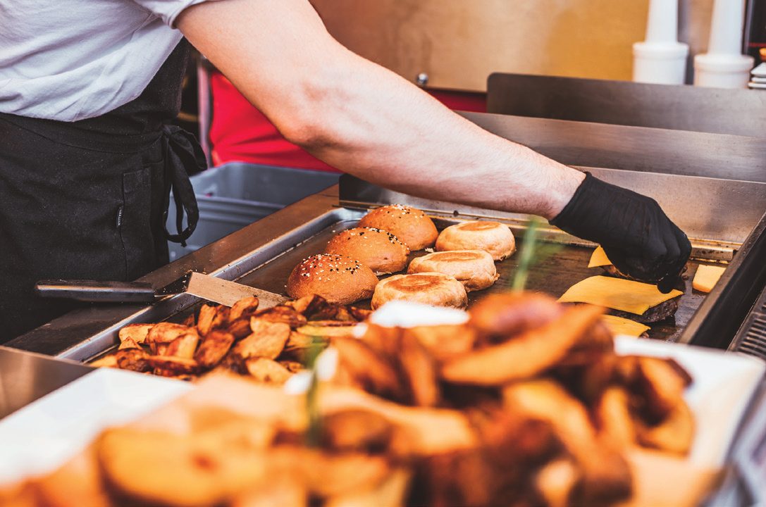 Commercial kitchen grill and hood surfaces that SIMIX Peroxide Cleaner degreases