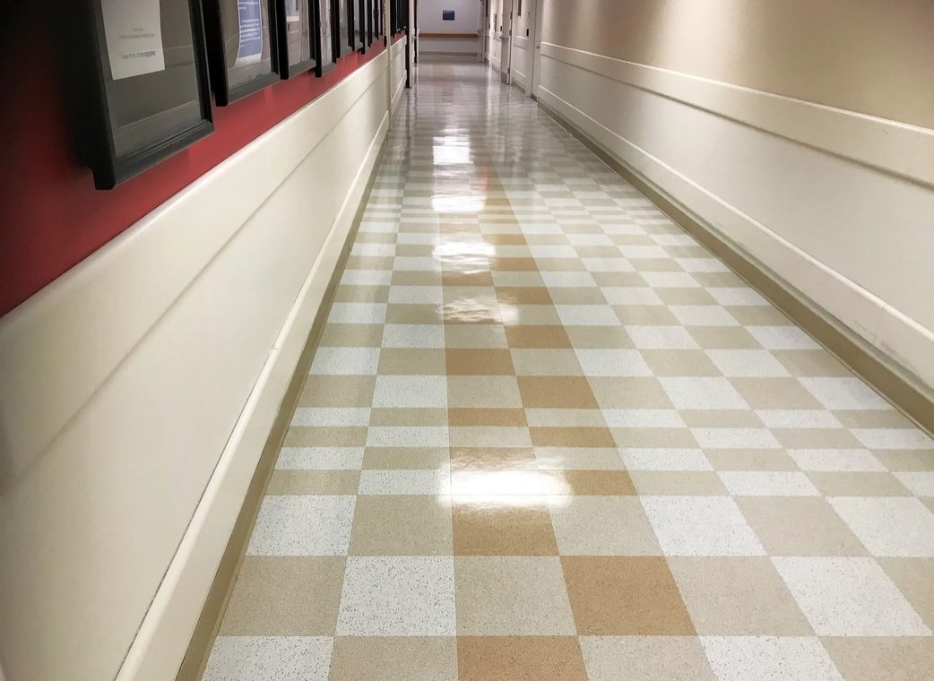 Glossy VCT tile corridor at a children's hospital maintained with SIMIX