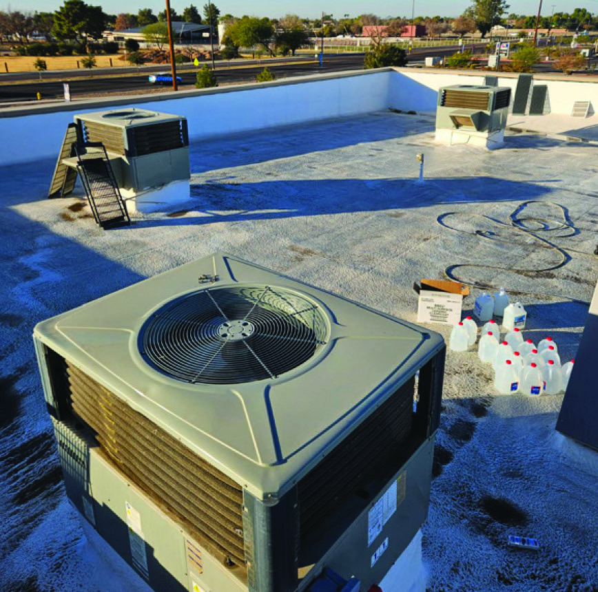 Rooftop air conditioning unit at the Gilbert, Arizona school cleaned and coated with SIMIX